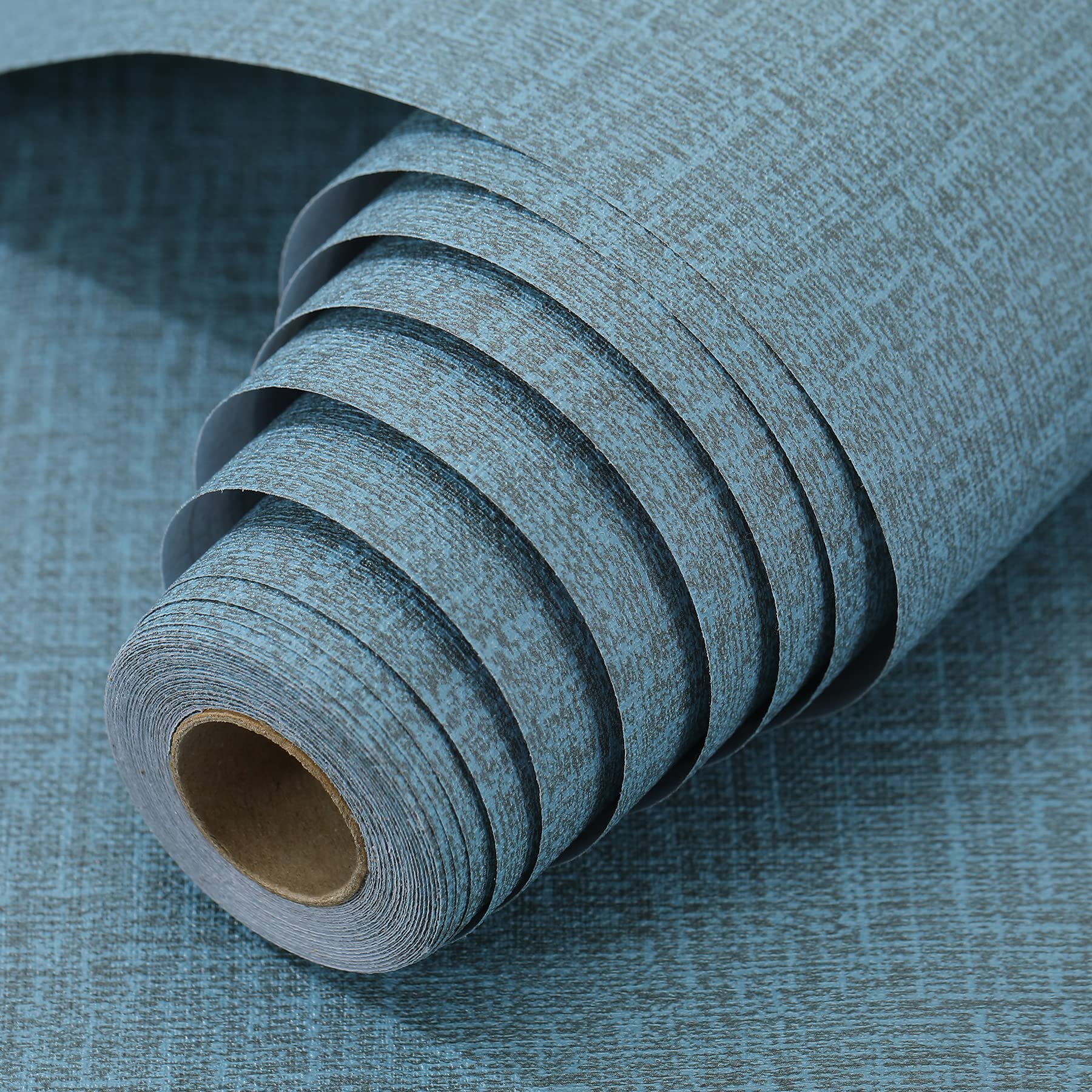Blue textured faux grasscloth wallpaper roll with self-adhesive backing