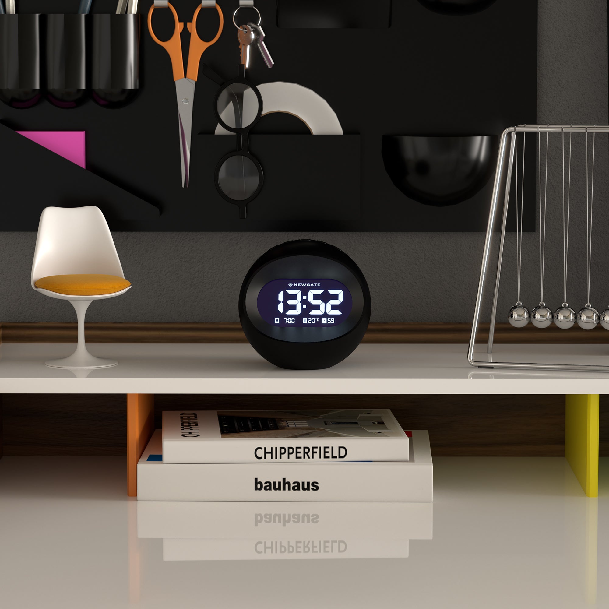 Black spherical LCD alarm clock on shelf, blue time display visible