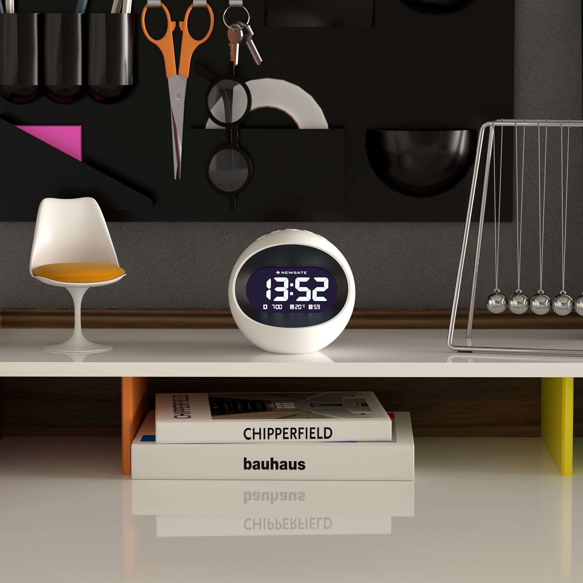 White round LCD alarm clock with blue time display showing 13:52