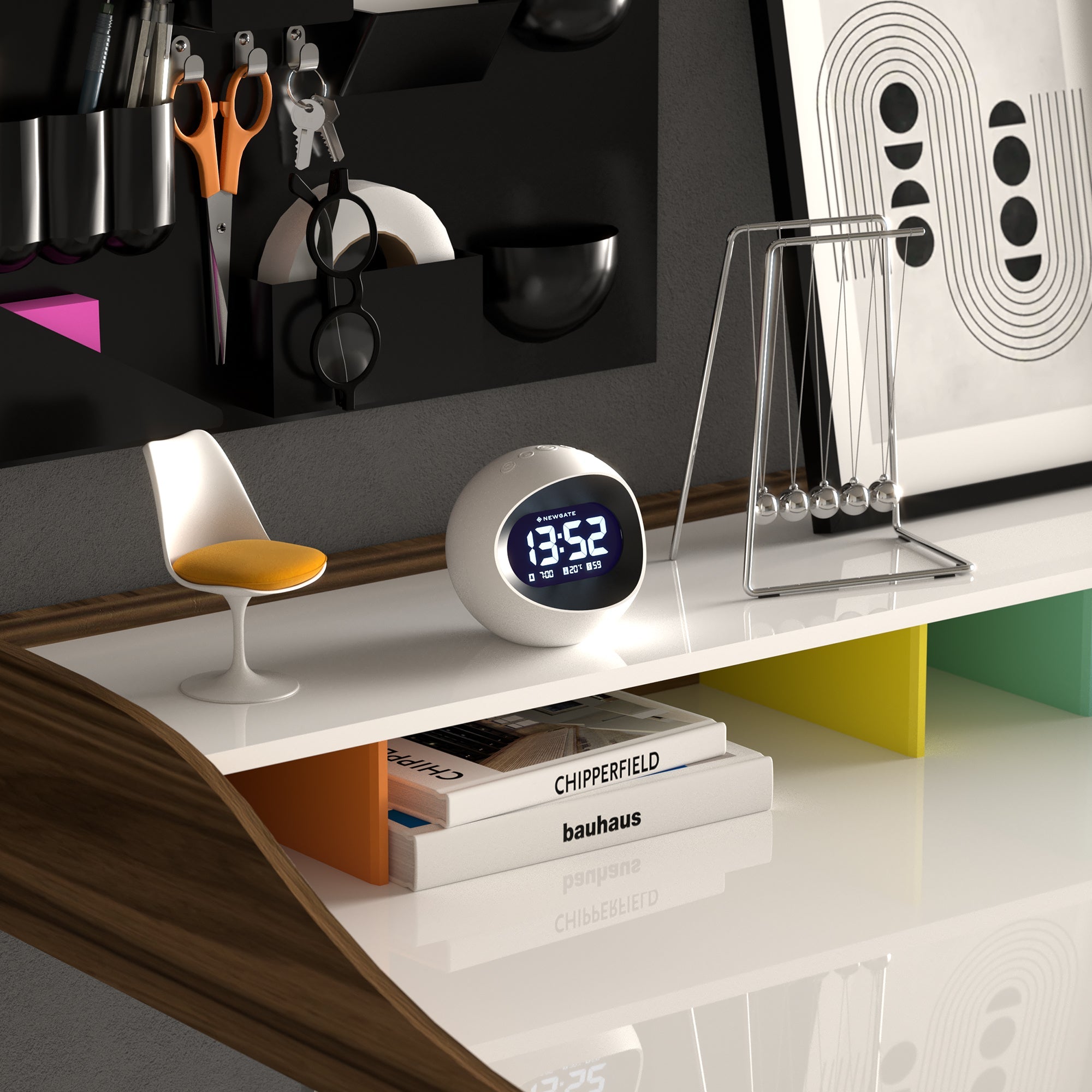 White round LCD alarm clock on tabletop with blue time display showing 13:52