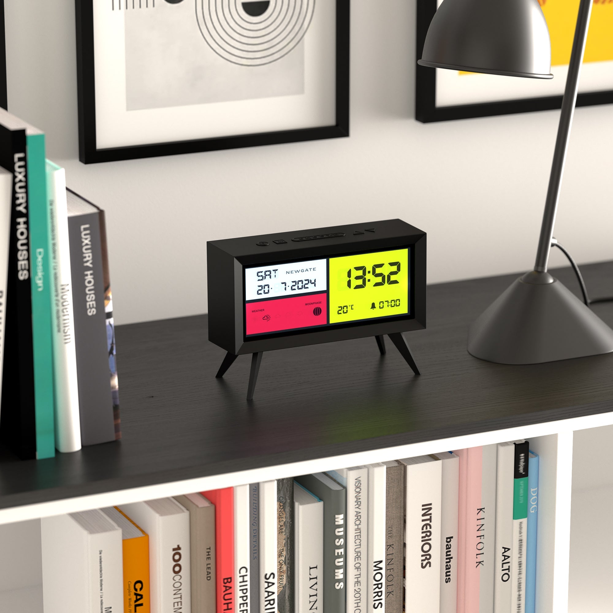 Matte black LCD alarm clock with green 13:52 time readout and red panel