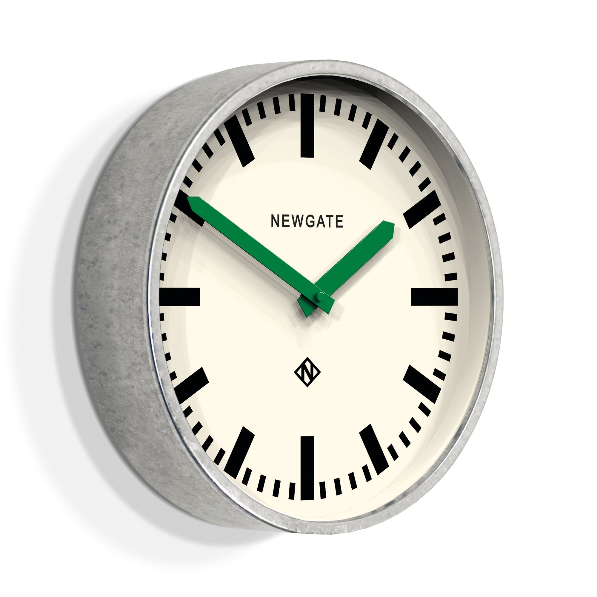 Round wall clock with cream face, black markings, green hands, and galvanised rim