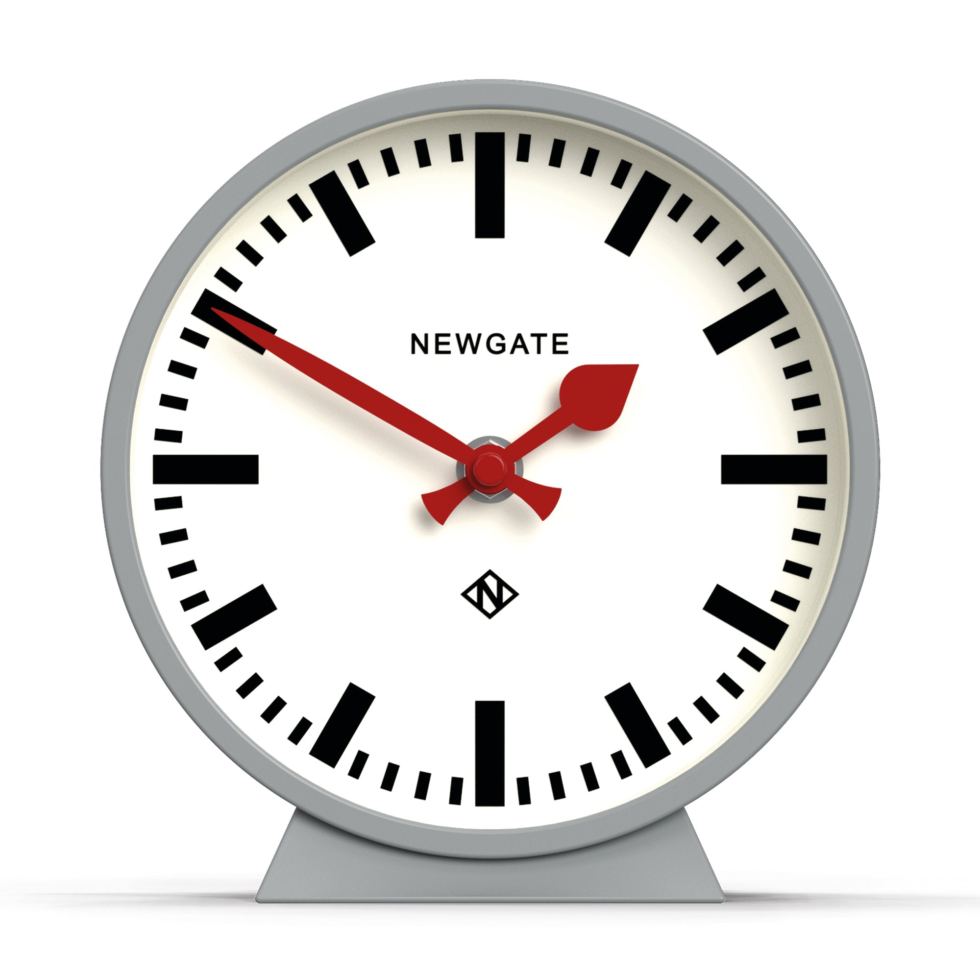 Grey mantel clock with white dial, black numerals, red hands, on standing base.