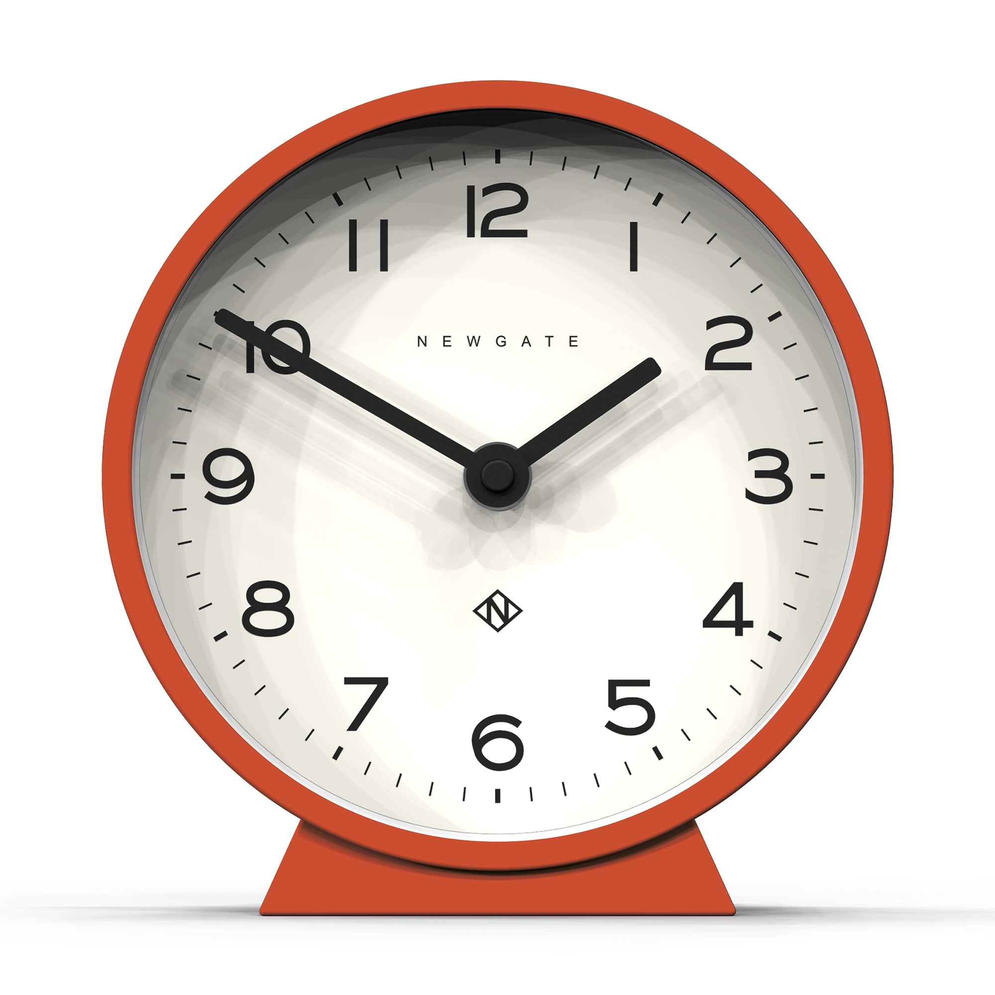 Orange mantel clock with white face, black hands and hour markers