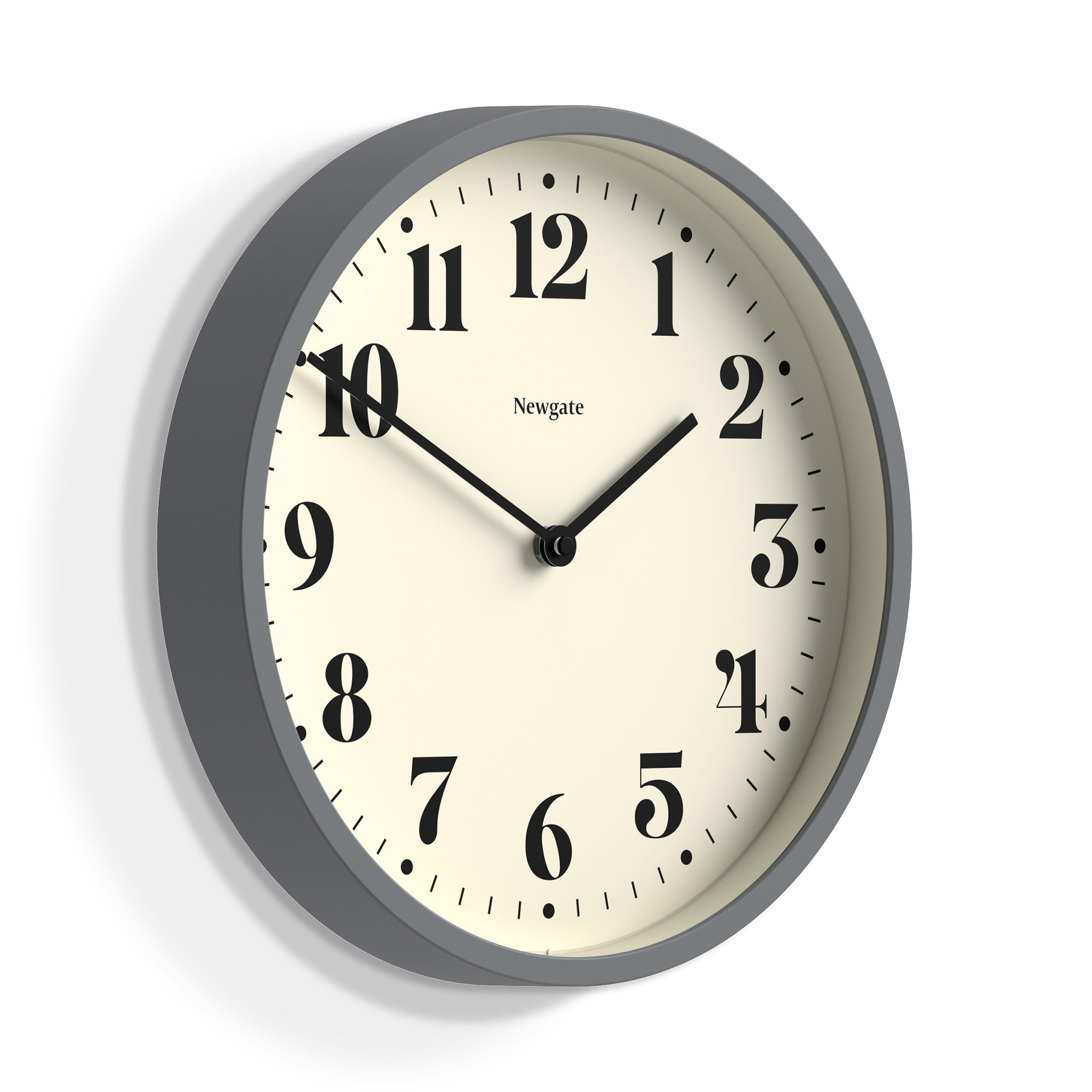 Round Newgate wall clock, matte dark navy casing, cream face with Roman numerals