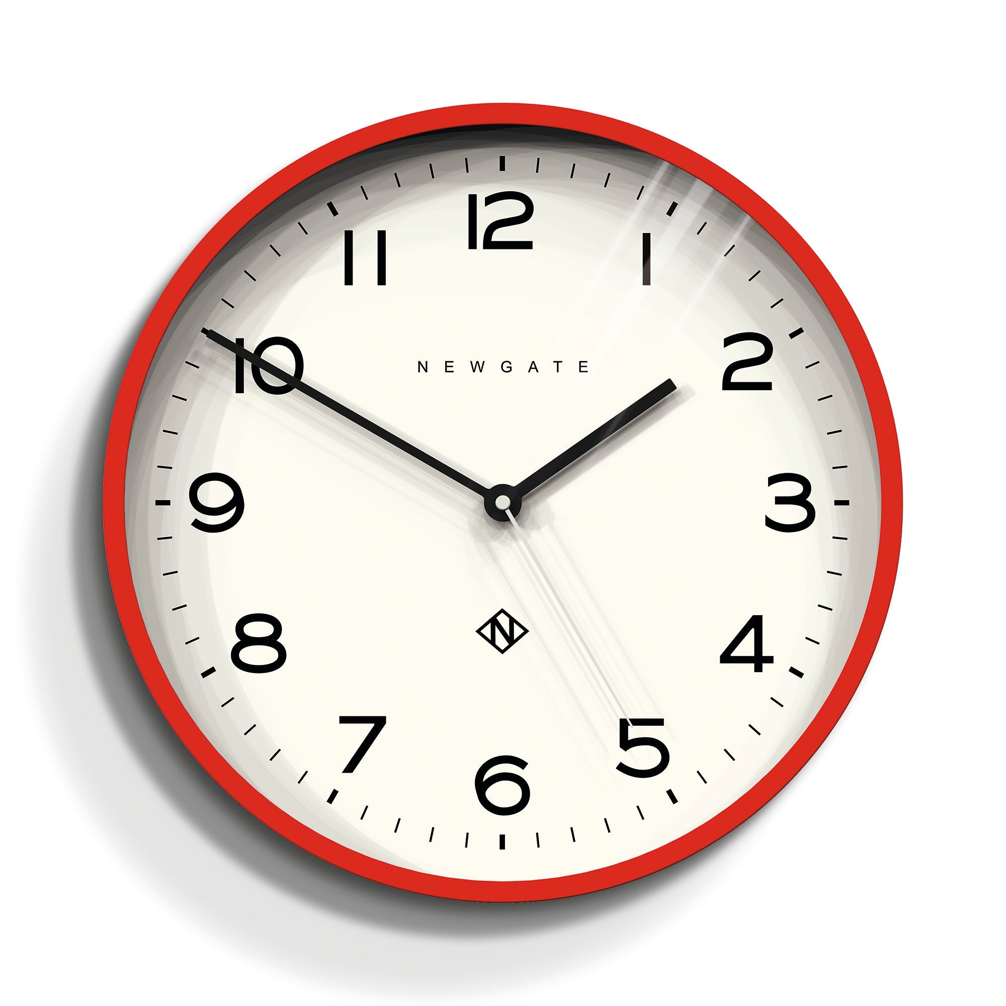 Red wall clock with white face, black hands and batwing hour markers
