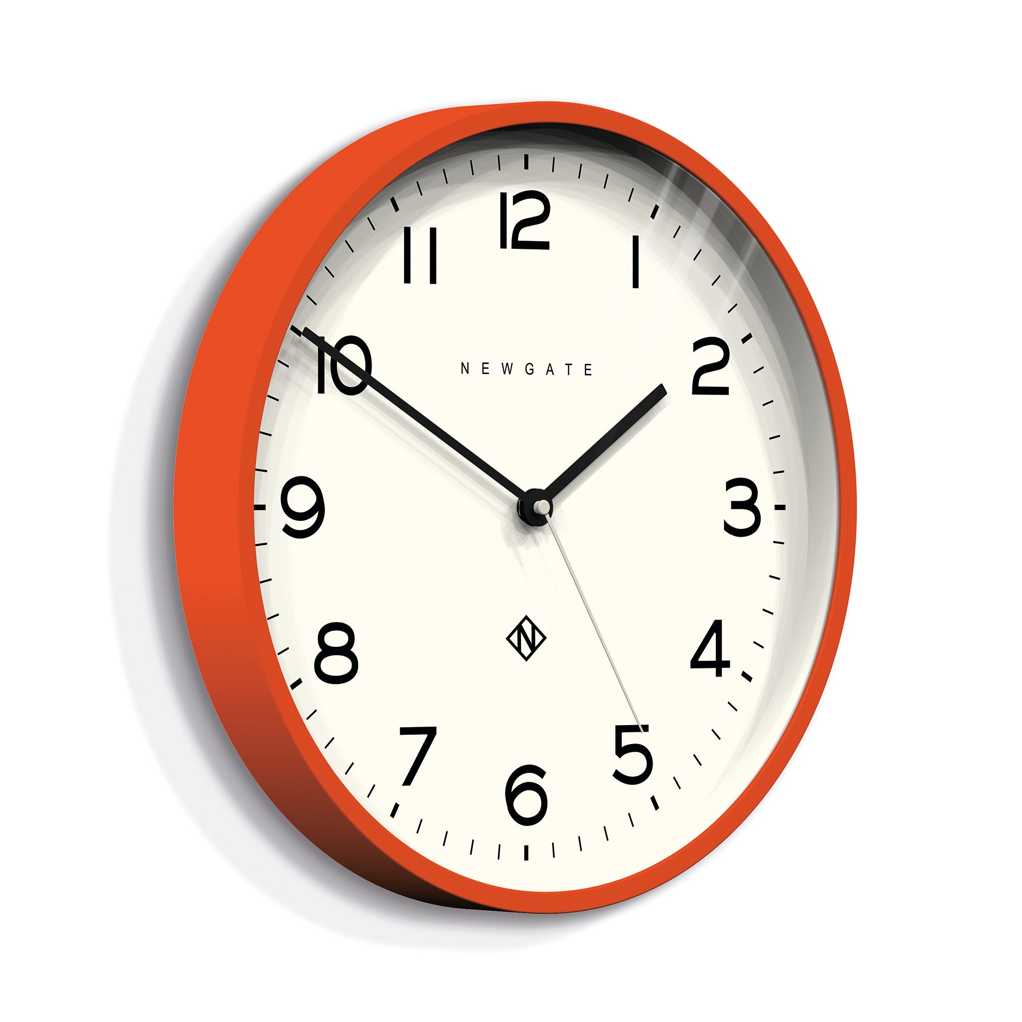 Orange oval wall clock with black hands, hour markers, Newgate Echo Number Three