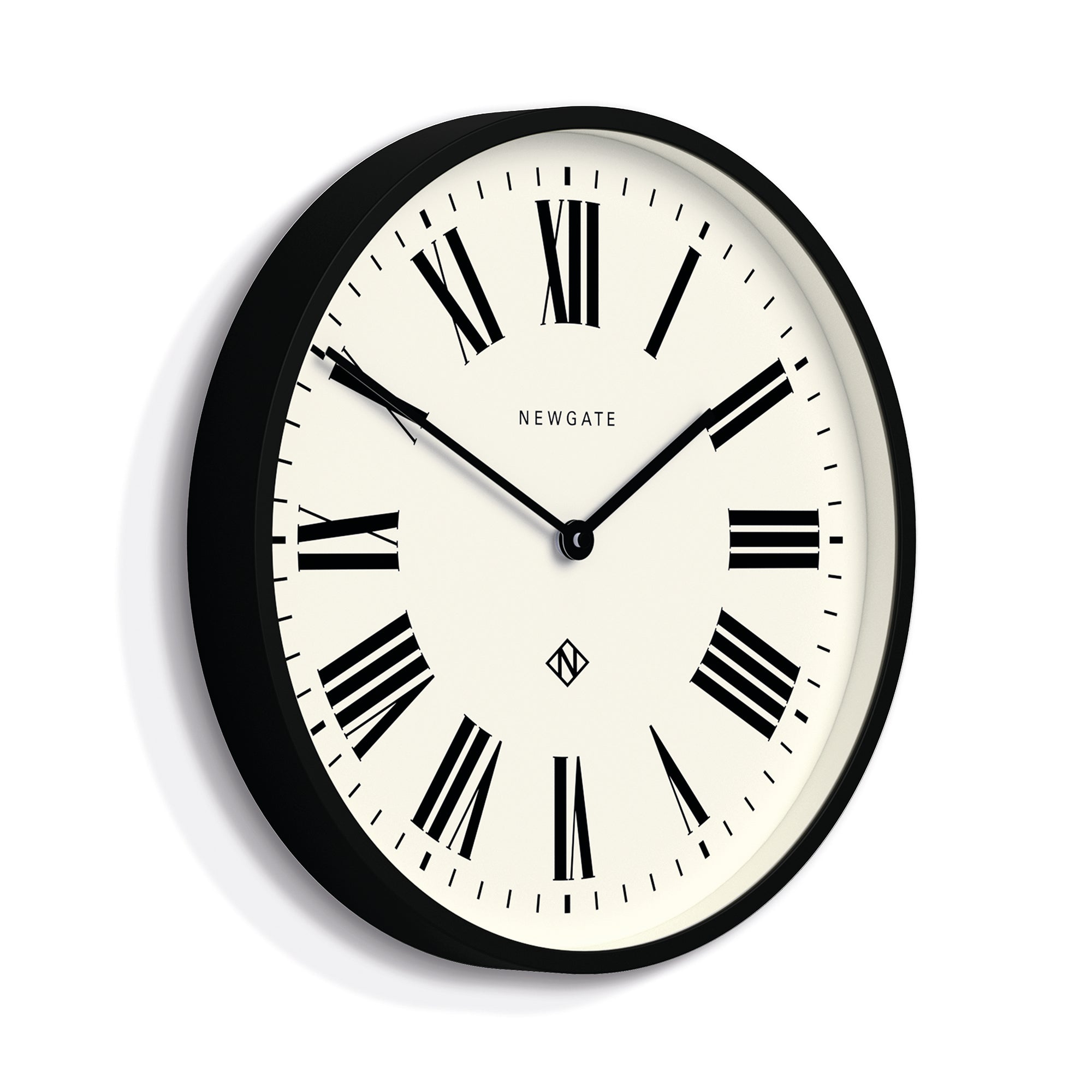 Black-framed wall clock with cream dial, Roman numeral markers and black hands