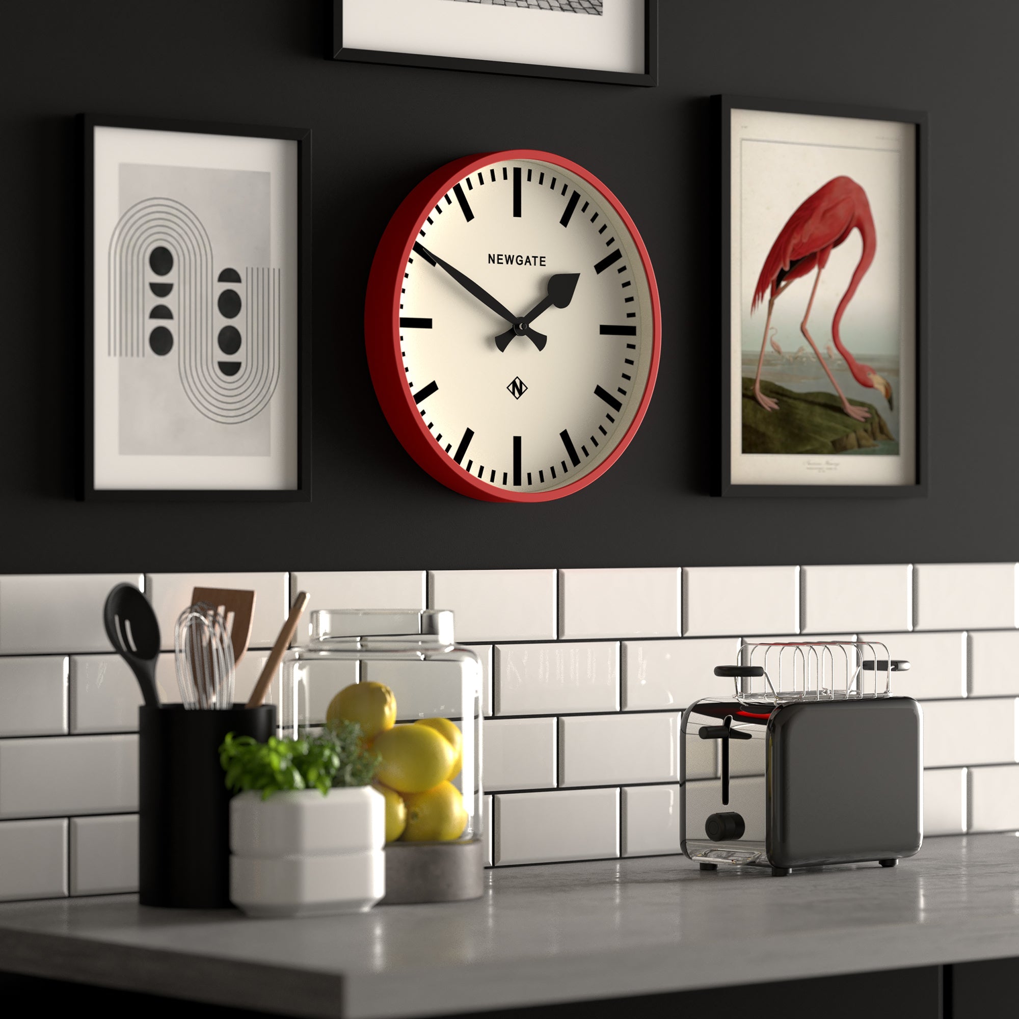 Red round wall clock with black hands and markers, Newgate logo on white face.