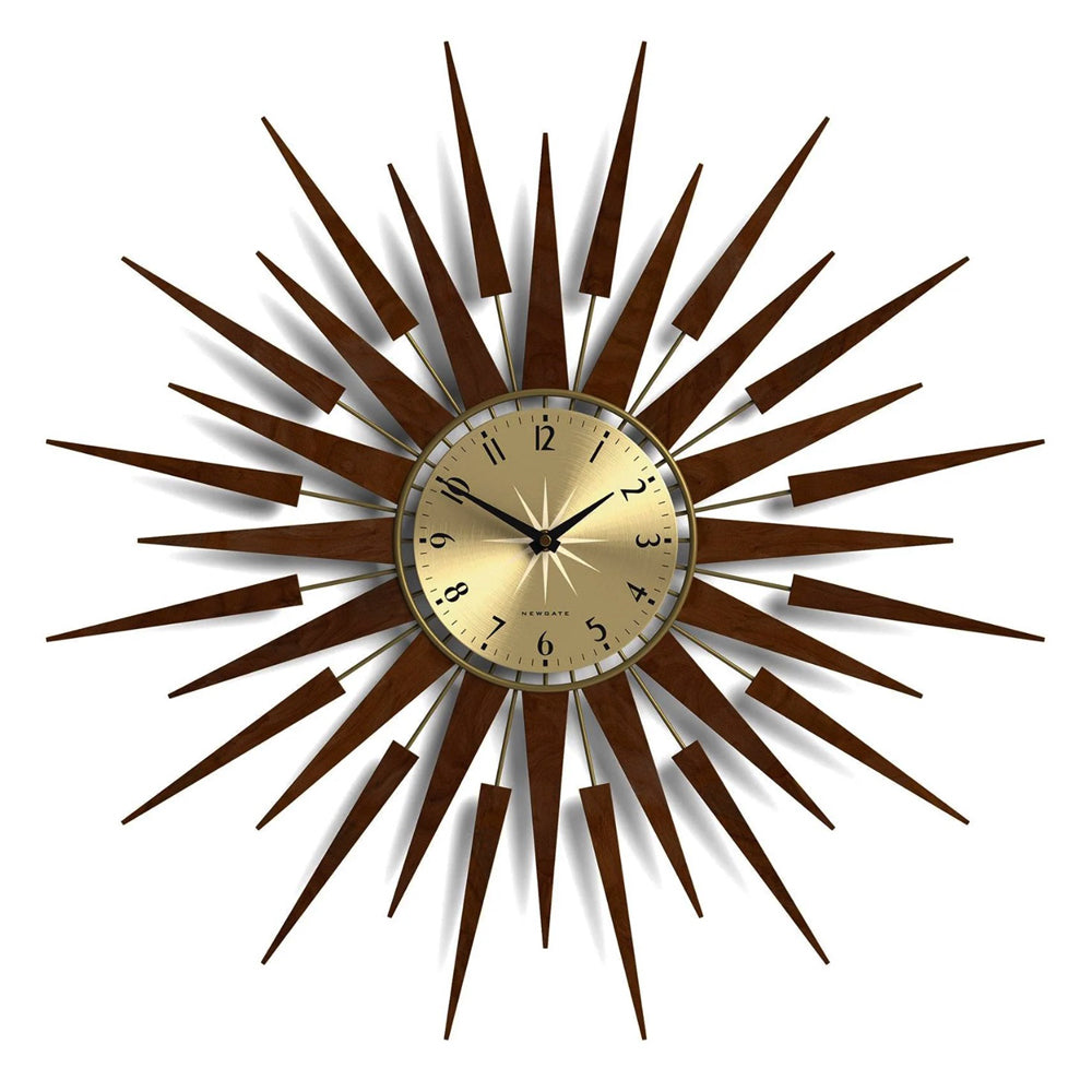Wall clock with cream face, black numbers, and dark radiating spiked frame