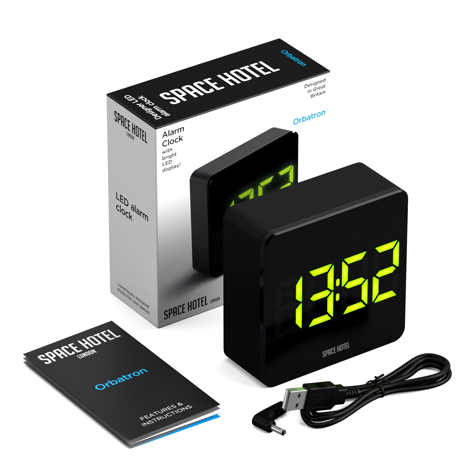 Space Hotel alarm clock set box with black clock, green LED digits, and power cable
