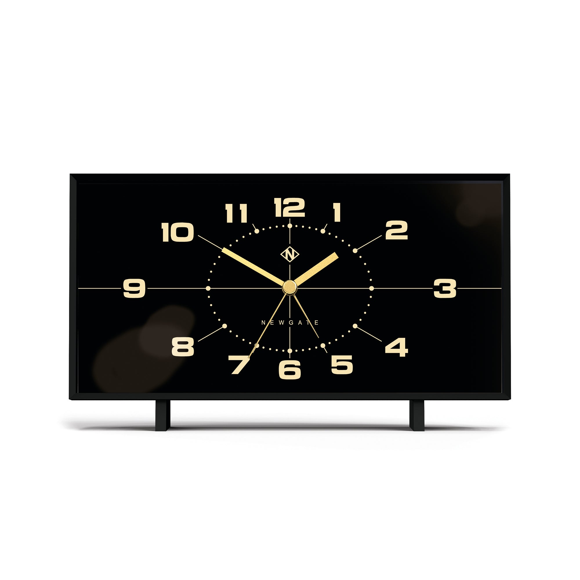 Black reverse-dial alarm clock with gold face and stand legs