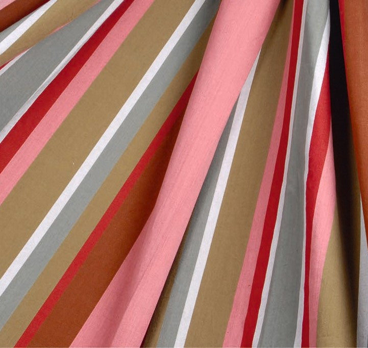 Striped cushion cover close-up with pink, red, beige, gray, and white vertical bands