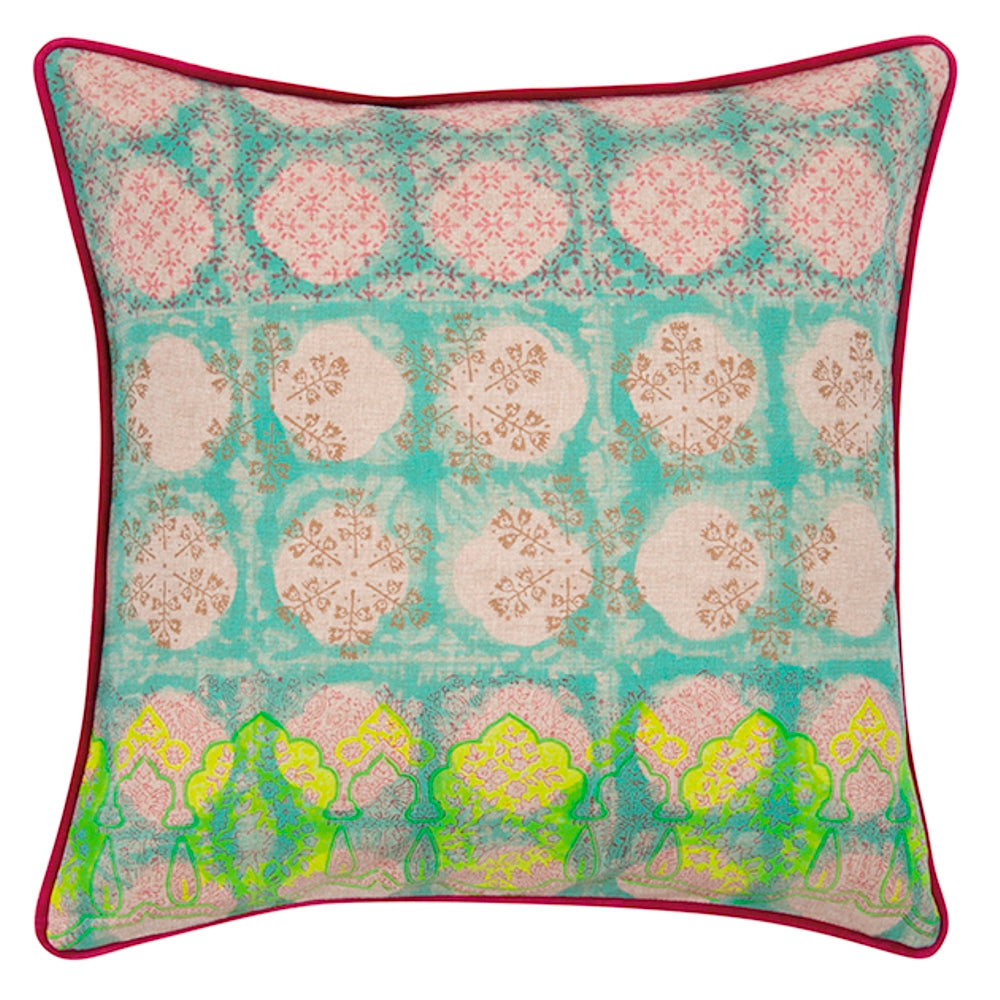 Multicoloured cushion cover with teal fabric, beige and pink circular motifs, red piping