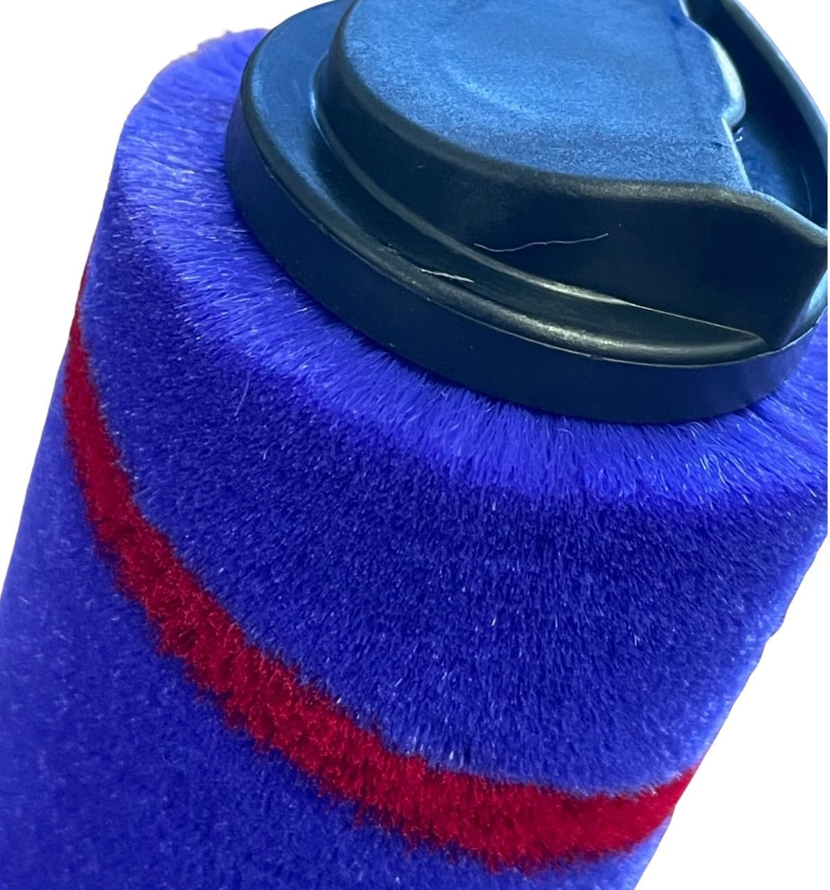 Close-up of blue and red bristle roller for a vacuum floor brush