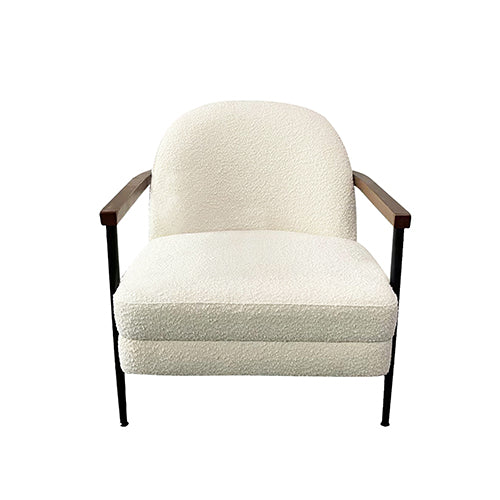 Rear view upholstered armchair with cream polyester fabric, dark wood armrests, black metal legs