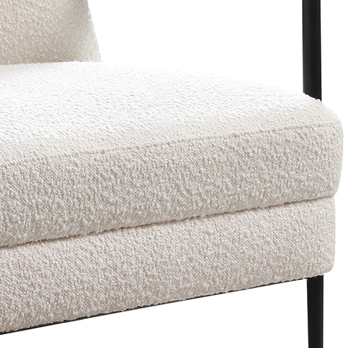 Armchair seat cushion close-up in cream textured polyester upholstery