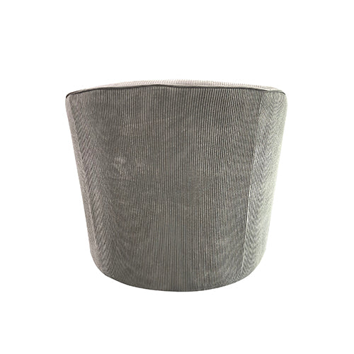 Grey fabric armchair viewed from back, with cylindrical shape and vertical stitching.