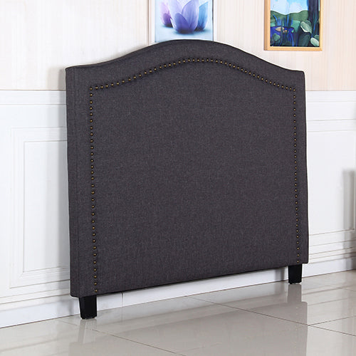 Charcoal fabric headboard with arched back, nailhead edging, and straight legs