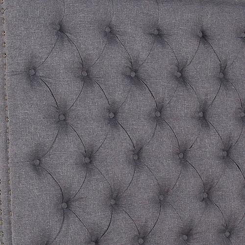 Charcoal fabric headboard panel with diamond tufting and button details