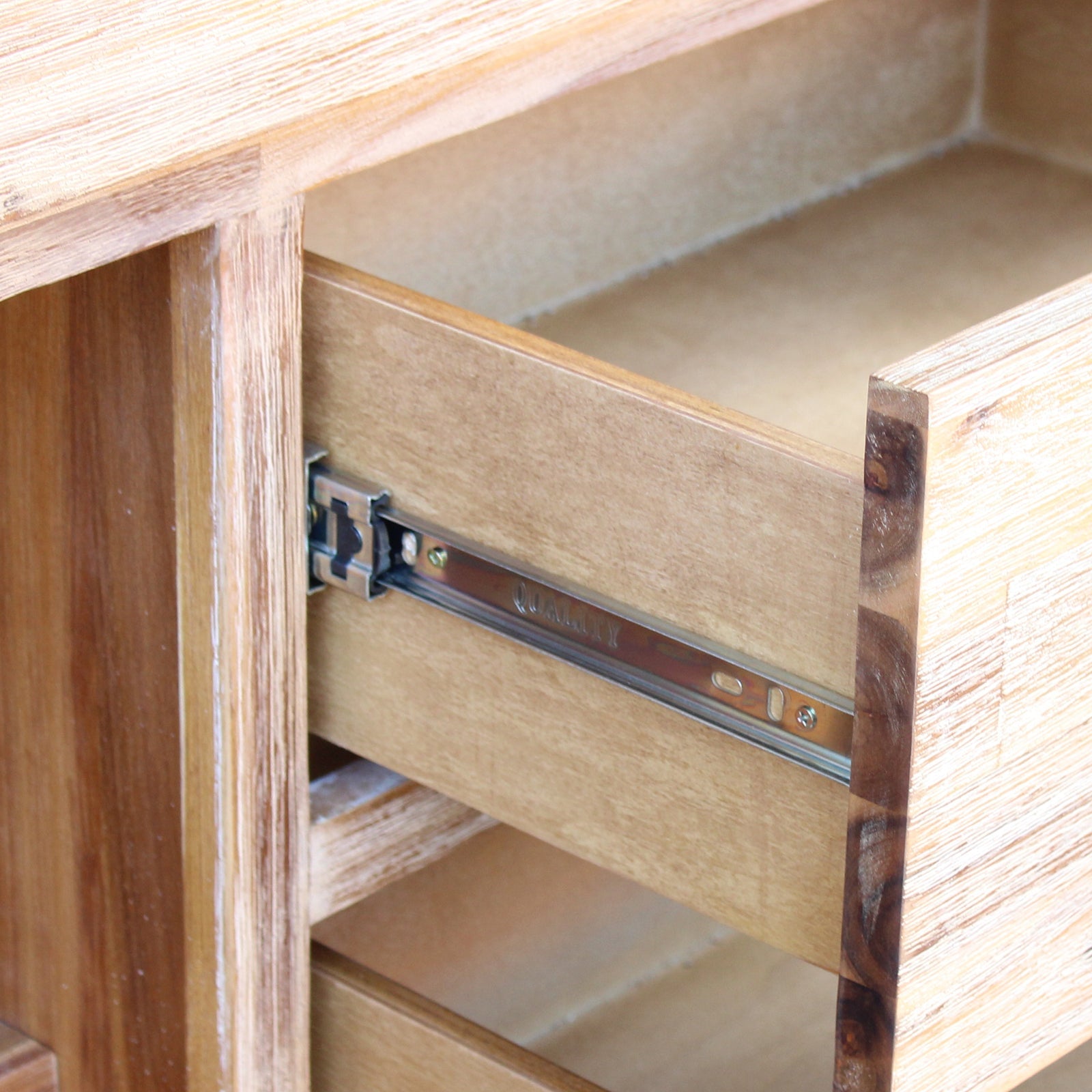 Drawer slide and metal brackets inside oak sideboard compartment