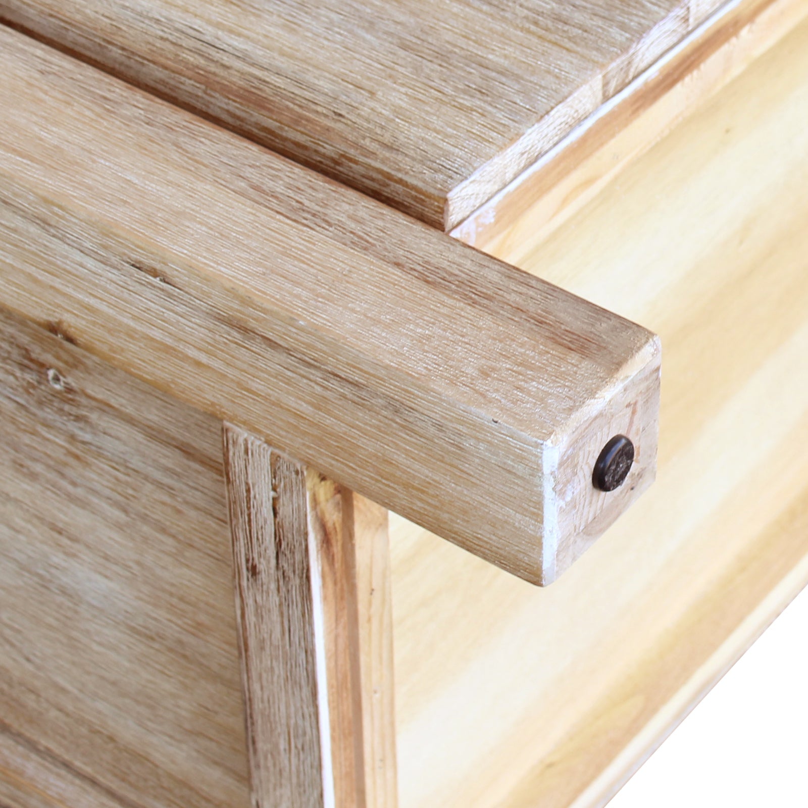 Oak sideboard door with round dark knob on outer panel