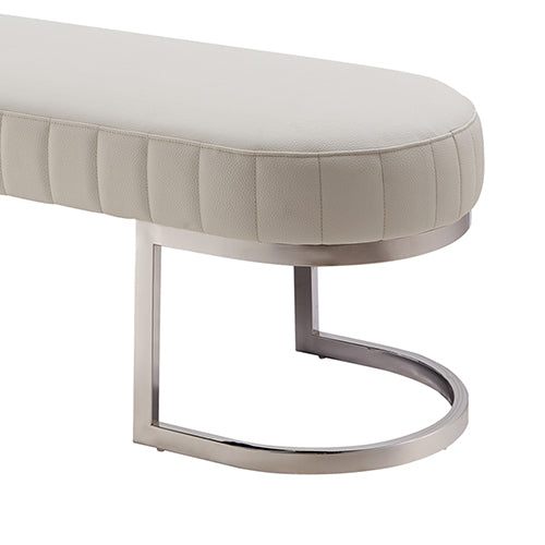 Padded bench chair with light beige upholstered seat and arched stainless steel support