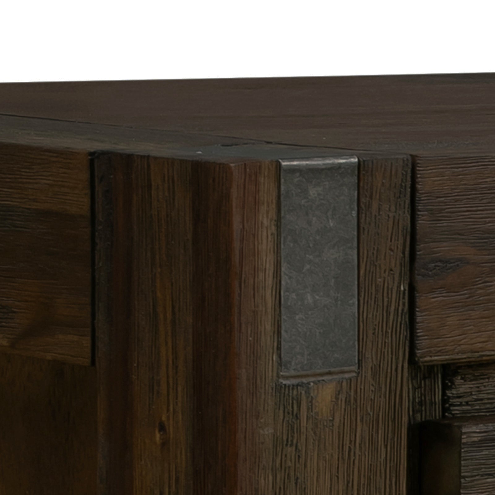 Hall table corner detail with dark acacia wood frame and recessed drawer pull plate.