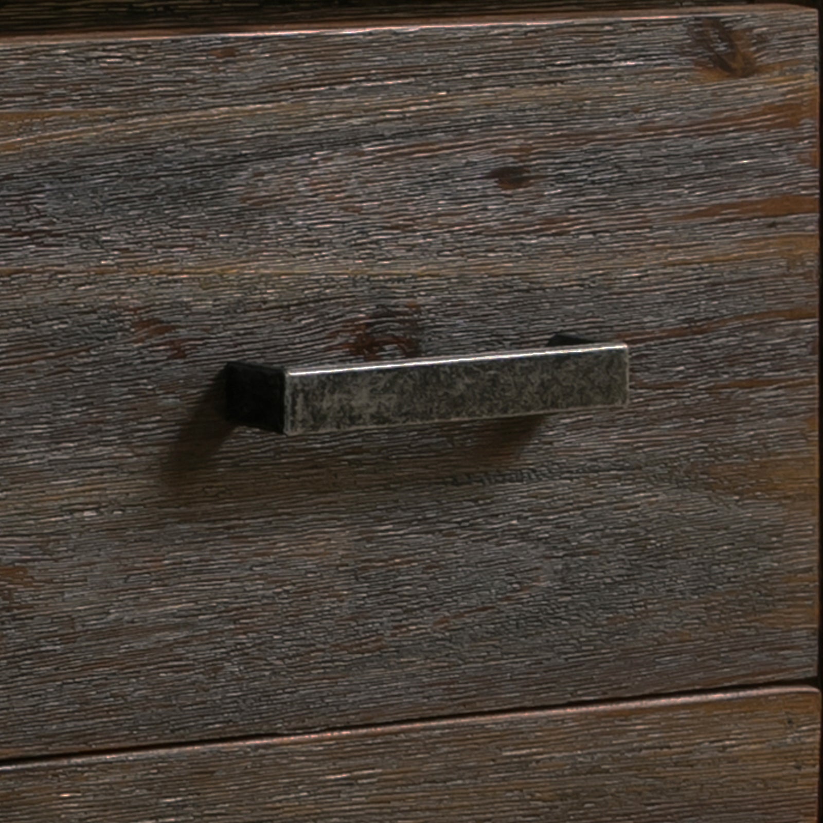 Dark acacia drawer front with rectangular metal bar handle set into the wood.