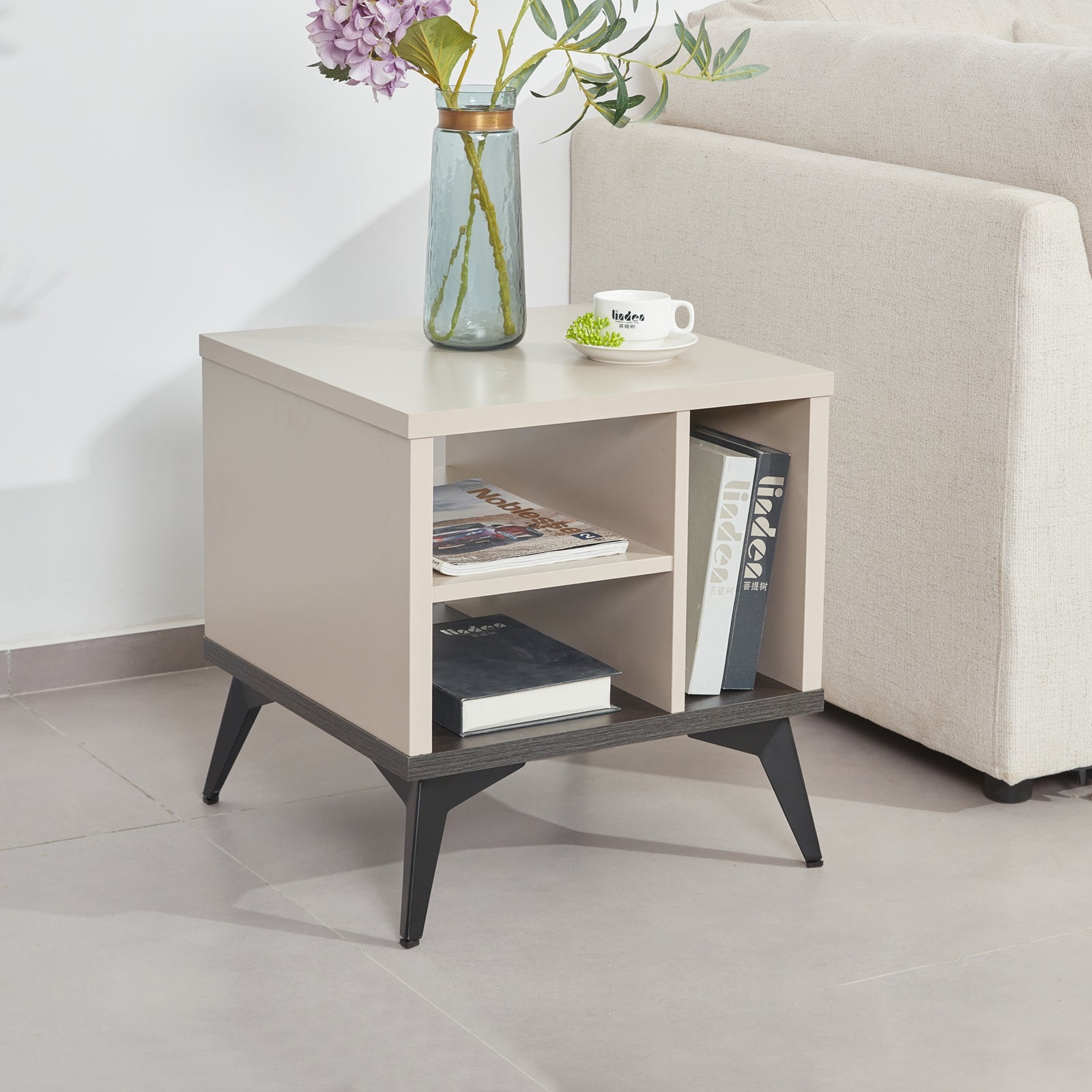 Champagne MDF side cabinet with open shelves and tapered dark legs