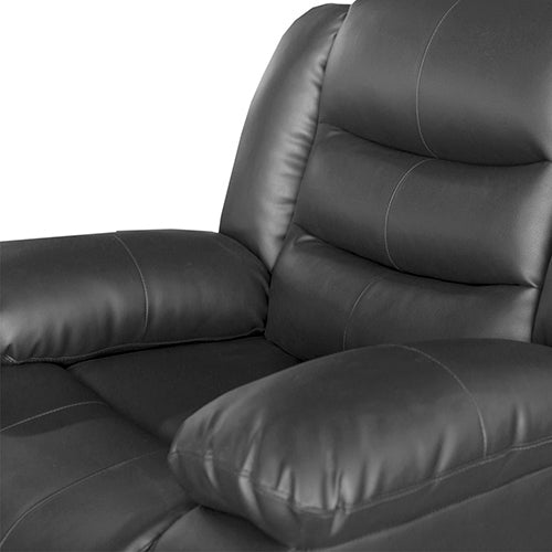 Black faux leather recliner with extended footrest and padded side armrest