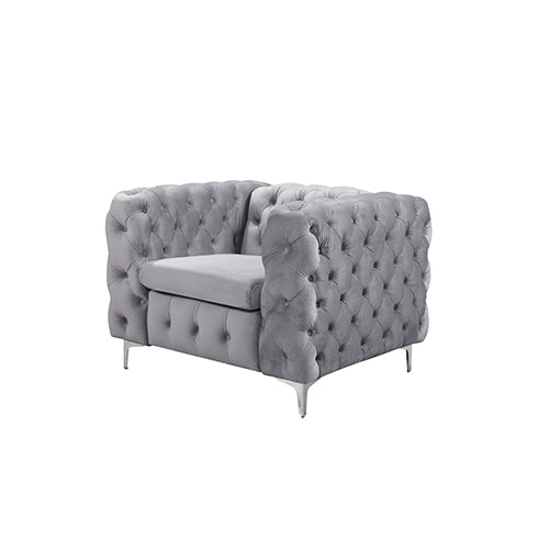Grey velvet button-tufted armchair, front view with metal tapered legs