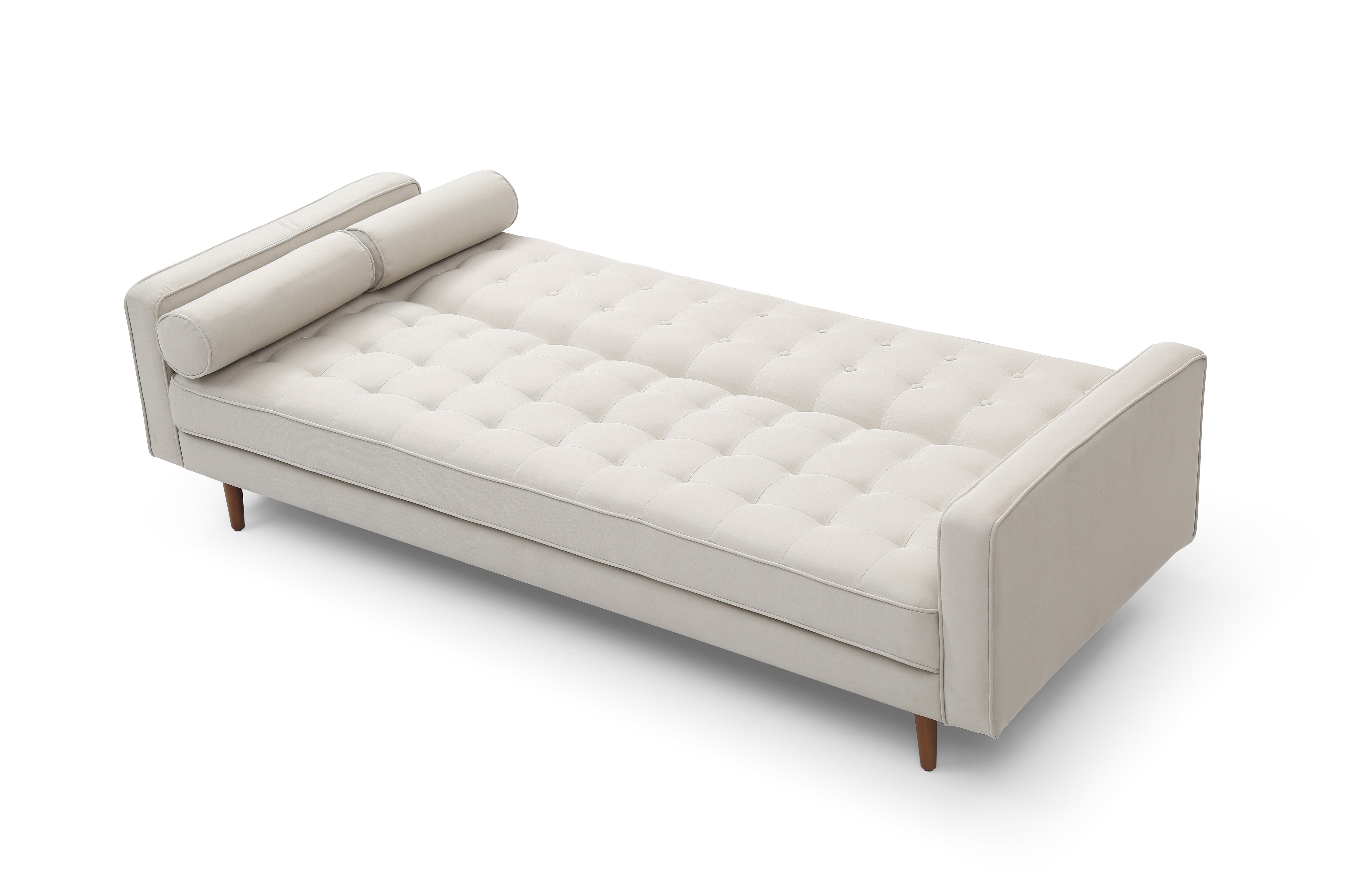 Beige sofa bed unfolded into a flat mattress with button-tufted top