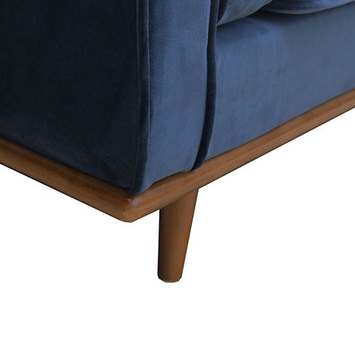 Armchair base view with dark blue fabric panels and wooden tapered legs