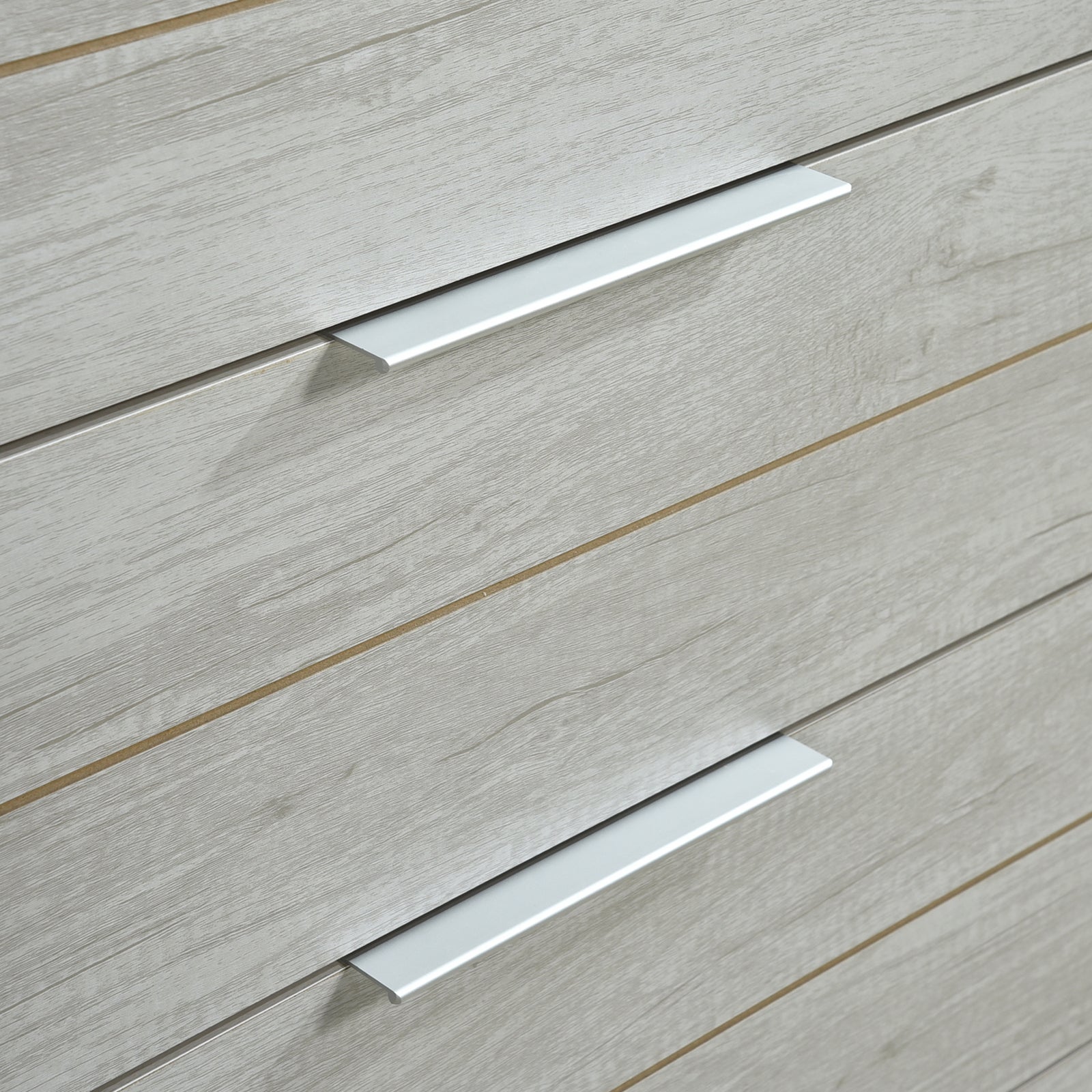 White ash-finish drawer fronts with silver bar handles