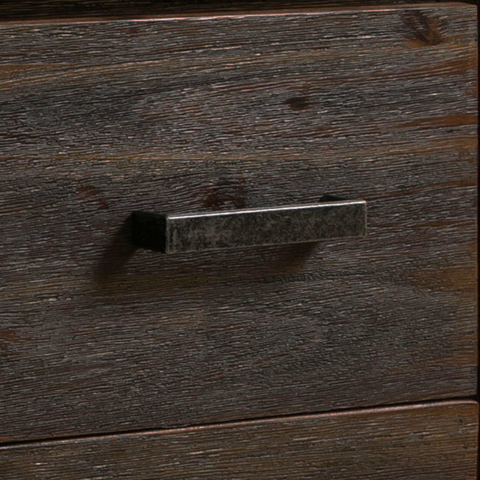 Metal drawer pull on dark brown acacia TV cabinet front