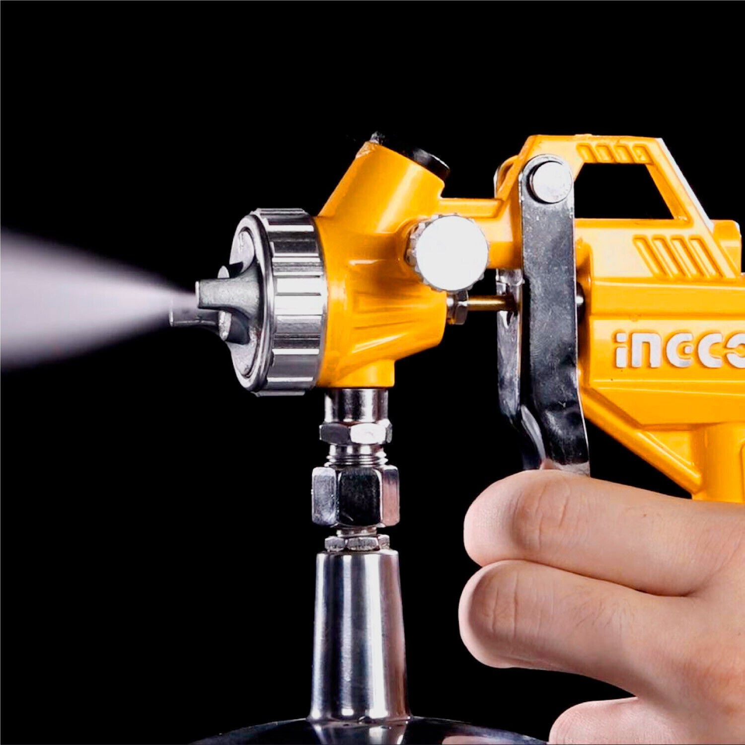 Ingco paint sprayer gun with front nozzle and hand holding the trigger