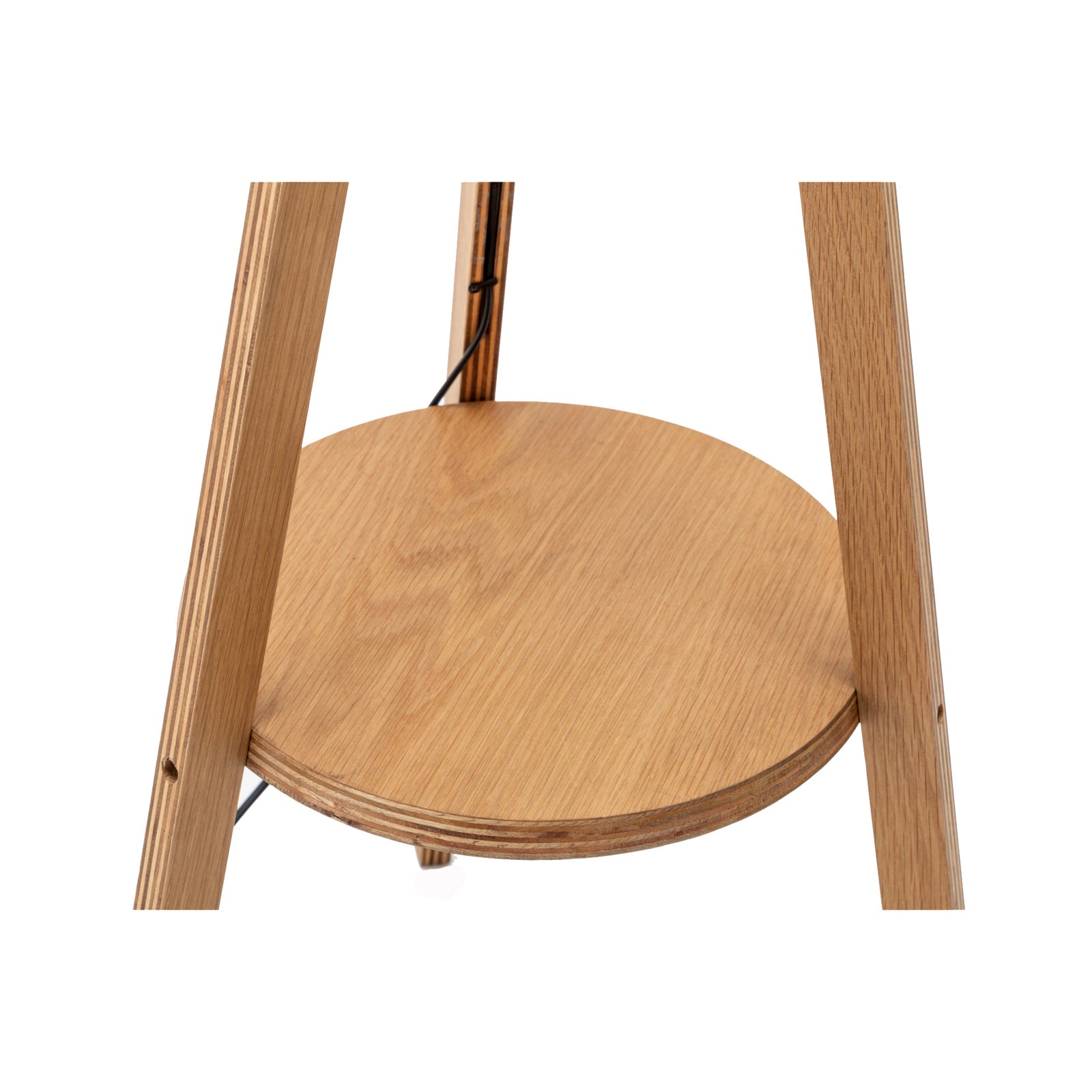 Round wooden shelf top with three tripod legs for floor lamp