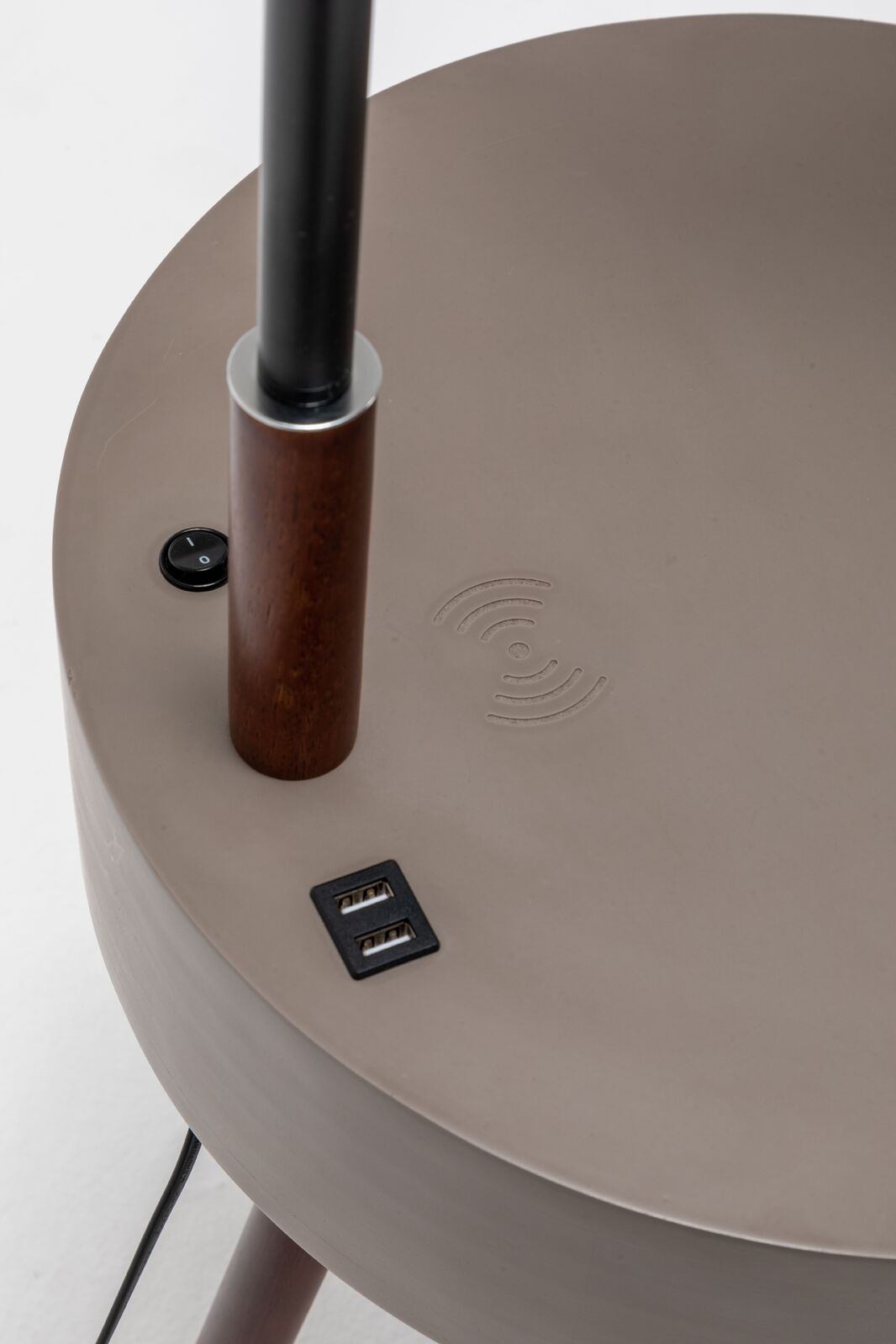 Lamp tabletop with two USB ports, power cord, and wireless charging symbol
