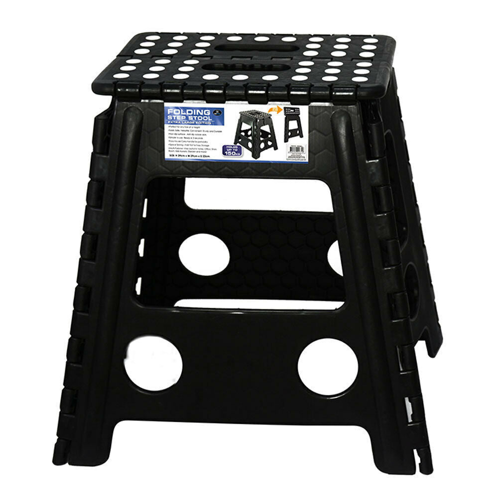 Black folding step stool with perforated platform top and side grip cutouts, compact chair