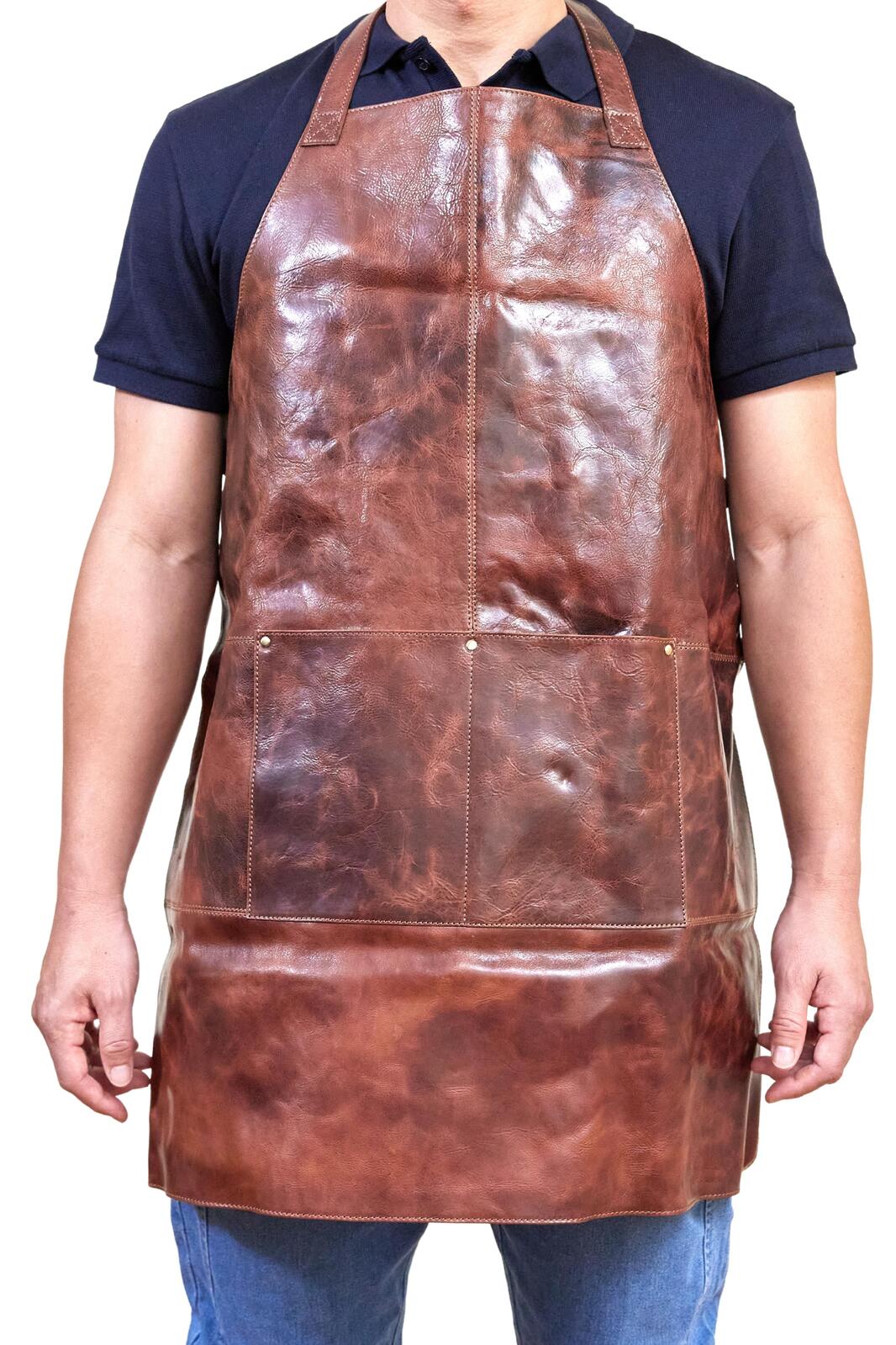 Cognac leather apron with front chest panel, neck strap, and waist ties
