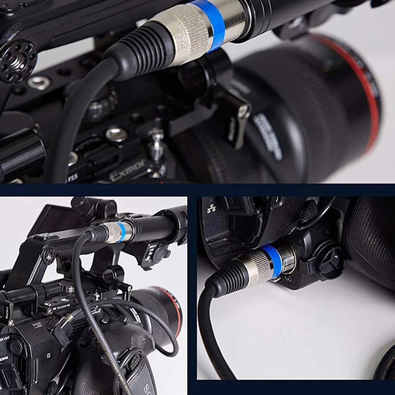 XLR audio cable connection on a production setup, silver connector and black cable