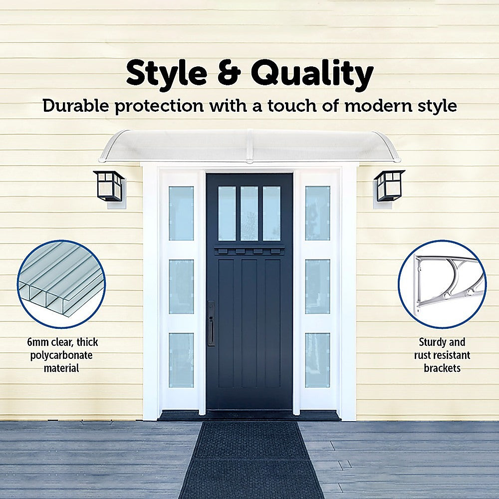 Clear outdoor awning cover above doorway with gray metal brackets