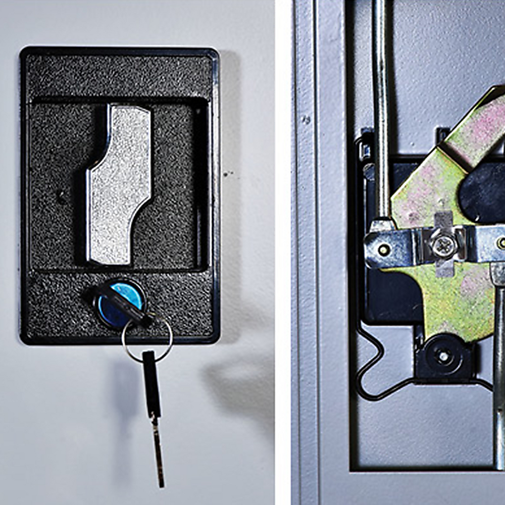 Key lock and key cylinder on a two-door storage cabinet door.