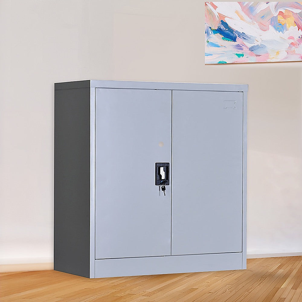 Two-door lockable storage cabinet with key lock, light gray exterior doors.