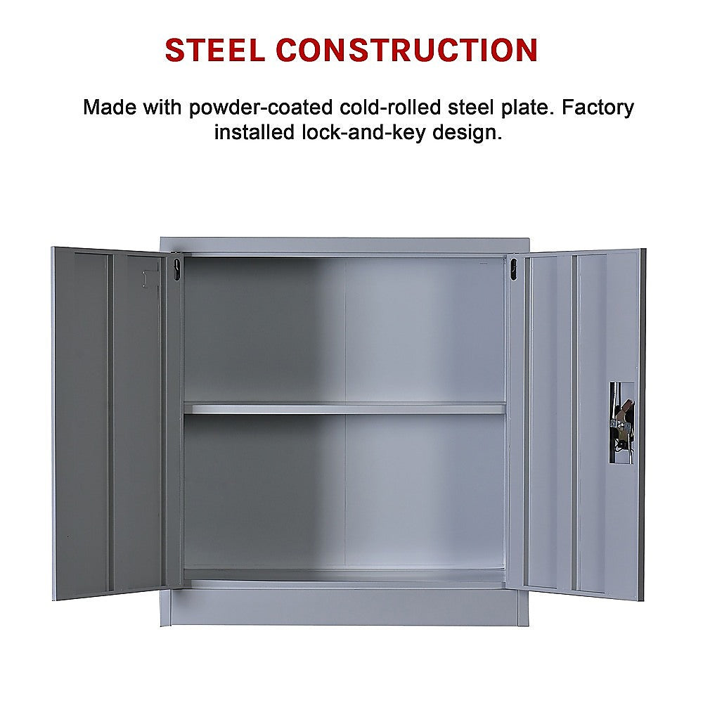 Grey filing storage cabinet with doors open, showing two interior shelves and lock