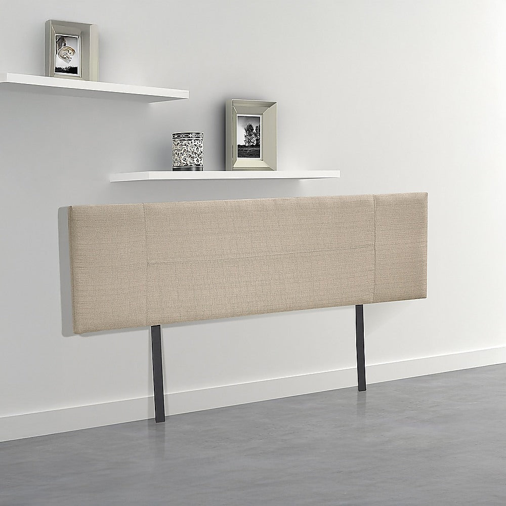 Beige linen king bed headboard on dark legs with rectangular upholstered fabric panel