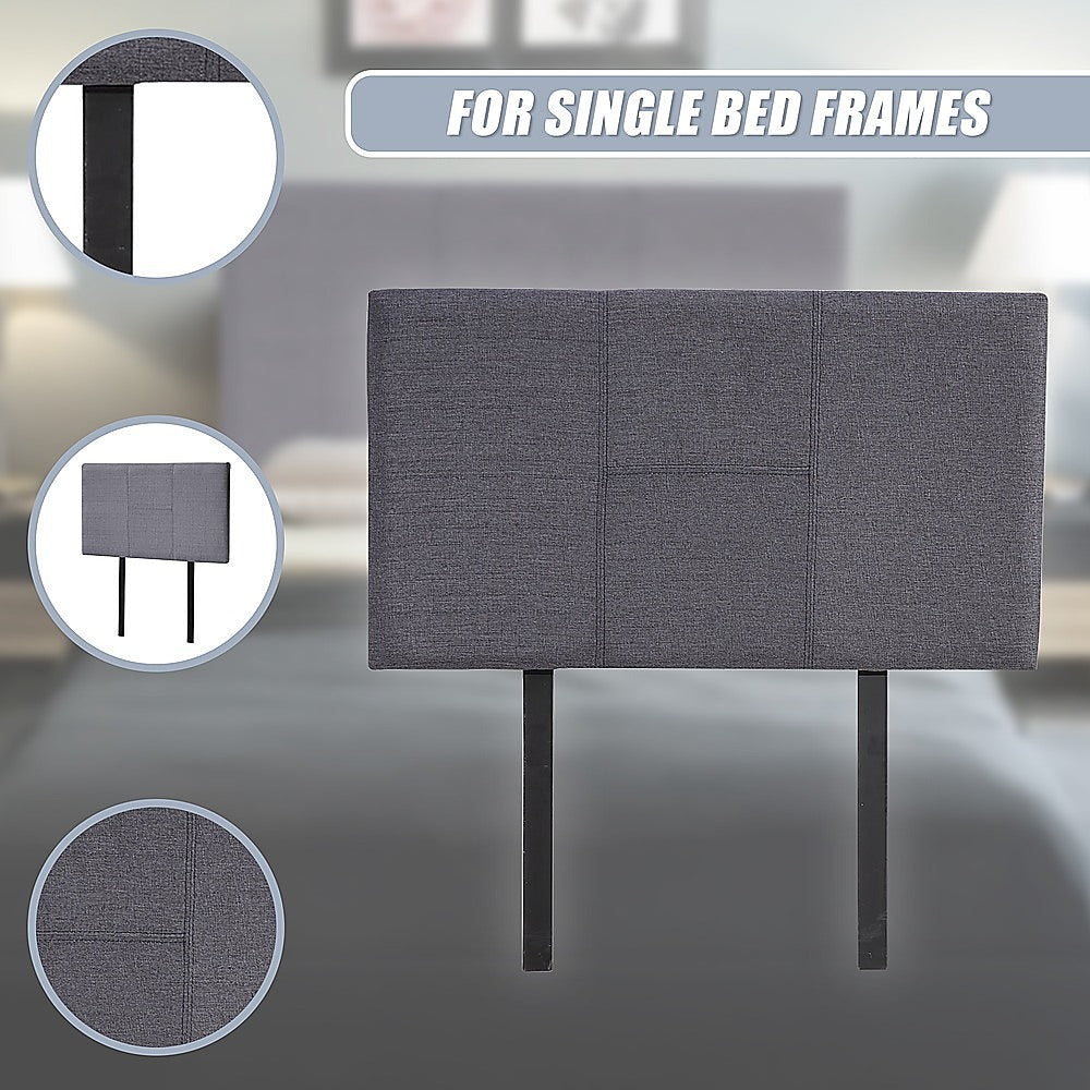 Grey linen single bed headboard with padded square panels and tapered legs.