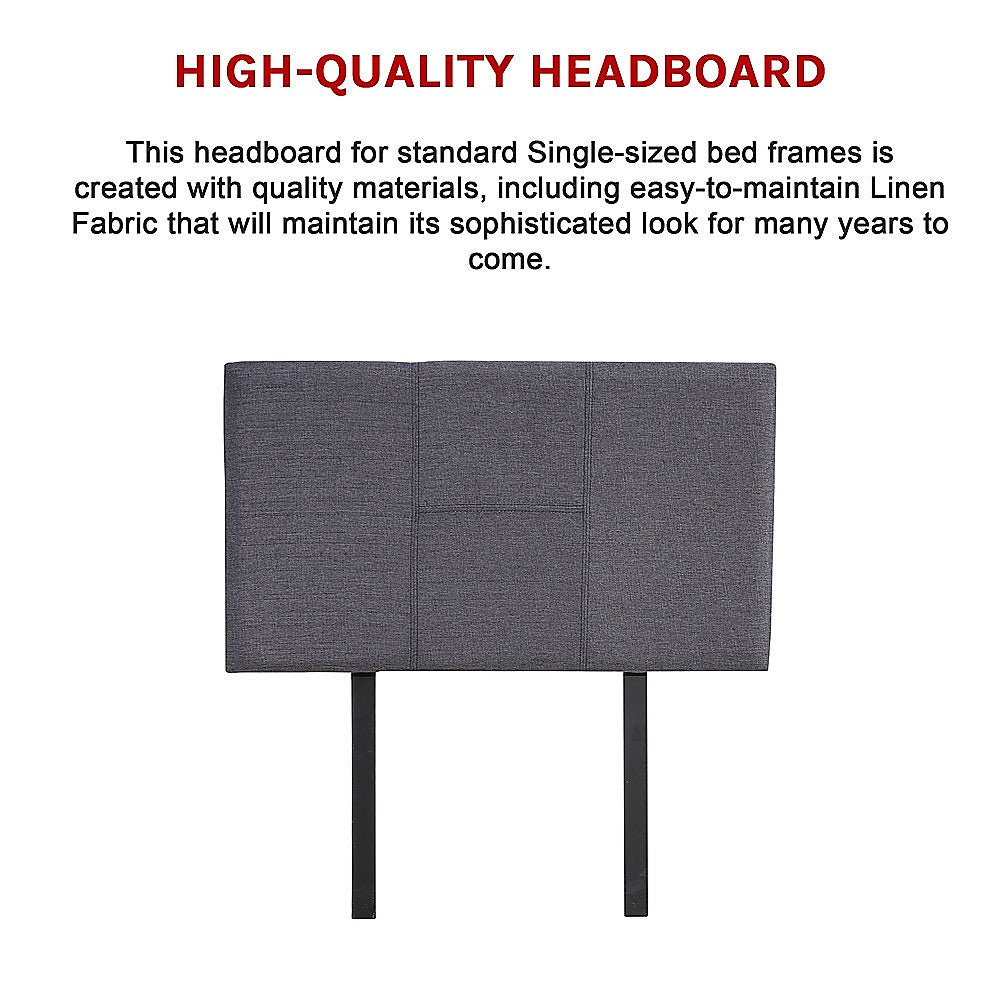 Grey linen headboard with stitched padded panels and black legs