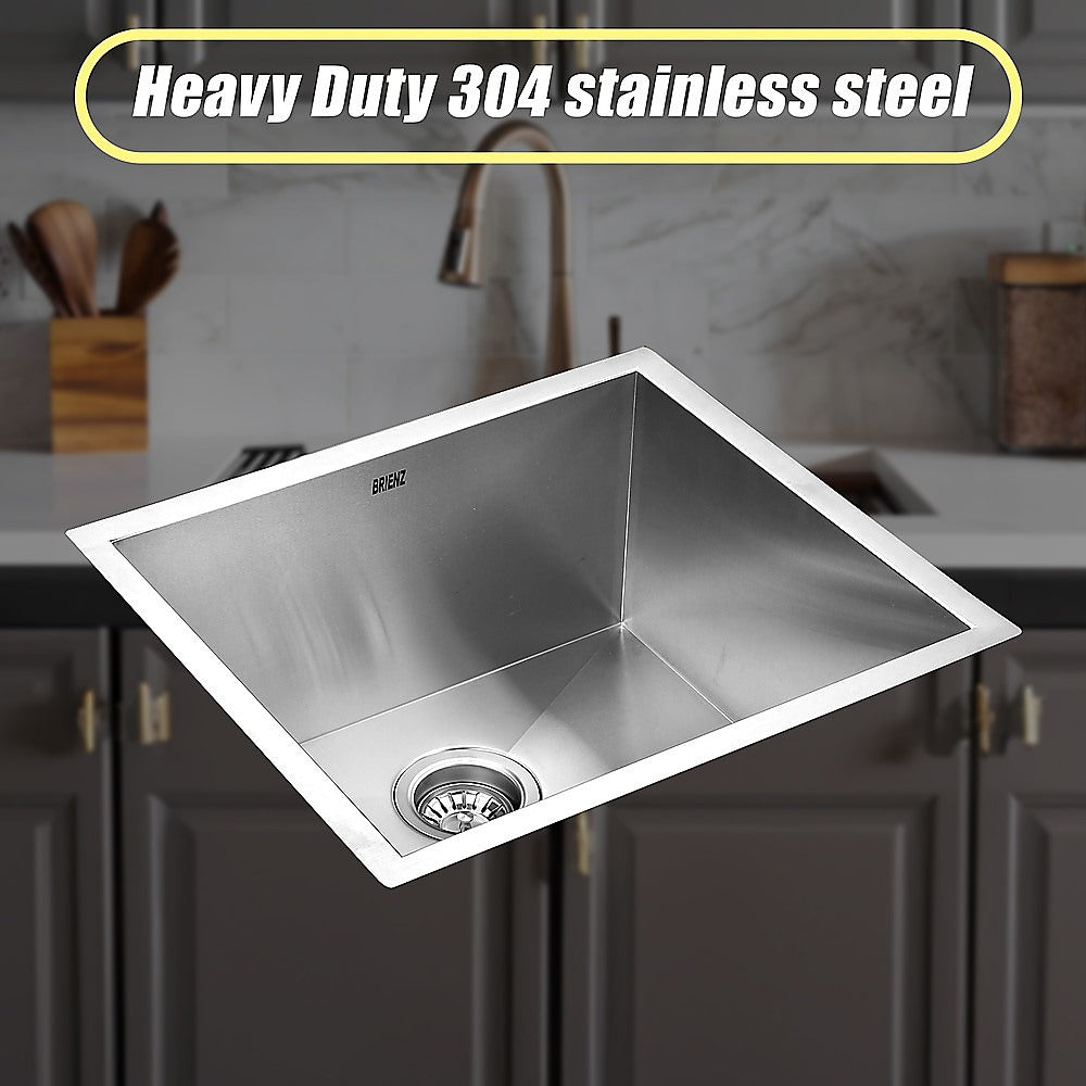 Stainless steel single-bowl sink with round drain and beveled rim